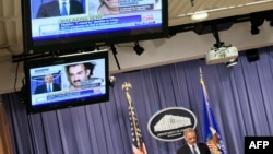 U.S. Attorney General Eric Holder speaks during a news conference in April 2011 announcing that accused 9/11 mastermind Khalid Sheikh Mohammad will be tried before a military commission.