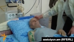 Armenia - Mamikon Khojoyan, a 77-year-old villager detained and later freed by Azerbaijan, is treated at a hospital in Ijevan, 5Mar2014.