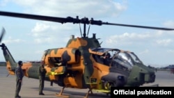 Azerbaijan - A Turkish AH-1W Super Cobra helicopter parked at an Azerbaijani military airfield, 20Sep2014.