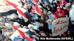 متظاهرون في القاهرة ضد حكم الرئيس المصري محمد مرسي في يوم 14 حزيران 2013