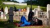 Bosnia-Herzegovina - Migrants sleep at a cemetery after migrant camp burned in Velika Kladusa, 1Jun2019