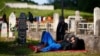 Migrants sleep at a cemetery close to Velika Kladusa, a town in Bosnia close to the border with Croatia. (file photo) 