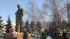 Ukrainian coal miners walk past a statue of Lenin on their way to a polling station in the eastern town of Gorlovka.
