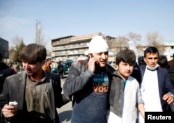 A survivor makes a telephone call shortly after the blast.