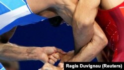 Выступления борцов греко-римского стиля в весовой категории до 59 килограммов на чемпионате мира во Франции. Париж, 22 августа 2017 года.