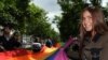 Activists hold a rainbow flag, the symbol of the gay rights movement, as they <a href="http://www.rferl.org/content/Gay_Pride_March_Held_In_Moscow_Despite_Ban/2056258.html"><b>march through Moscow</a></b> on May 29. The gay pride parade took place for the first time in the Russian capital without arrests or violence by counterprotesters.
<br /><br />Photo by Andrey Smirnov for AFP 