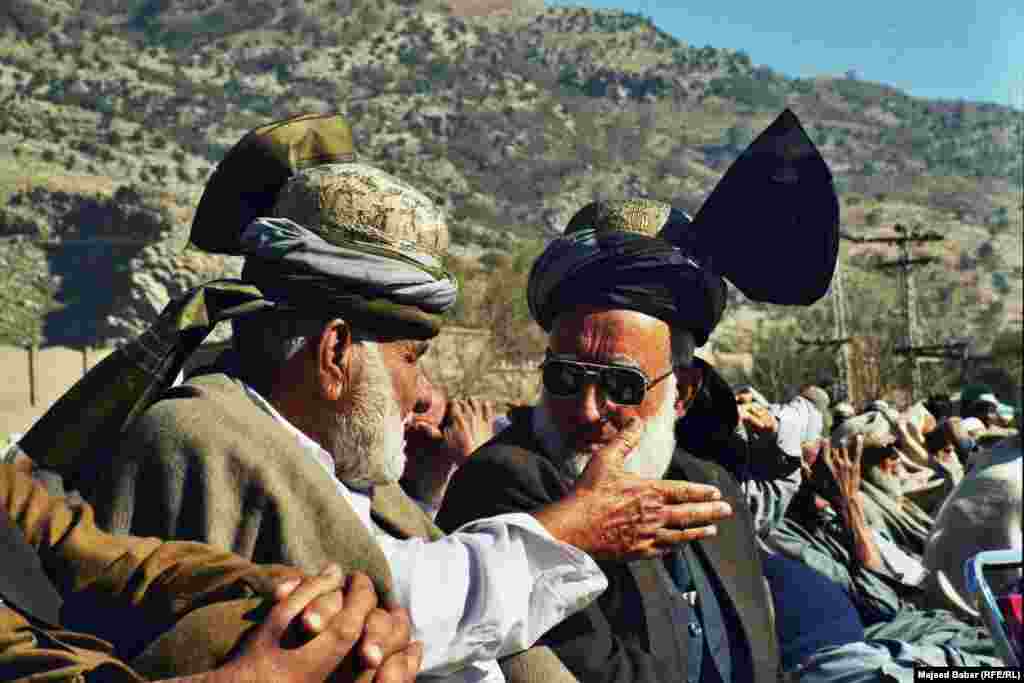 Deliberations are a part of the jirga. Here, two clan leaders from the Afridi tribe debate the deployment of the Pakistani army to the Federally Administered Tribal Areas in late 2001.