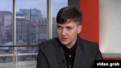Ukrainian lawmaker Nadia Savchenko speaking to RFE/RL on December 13