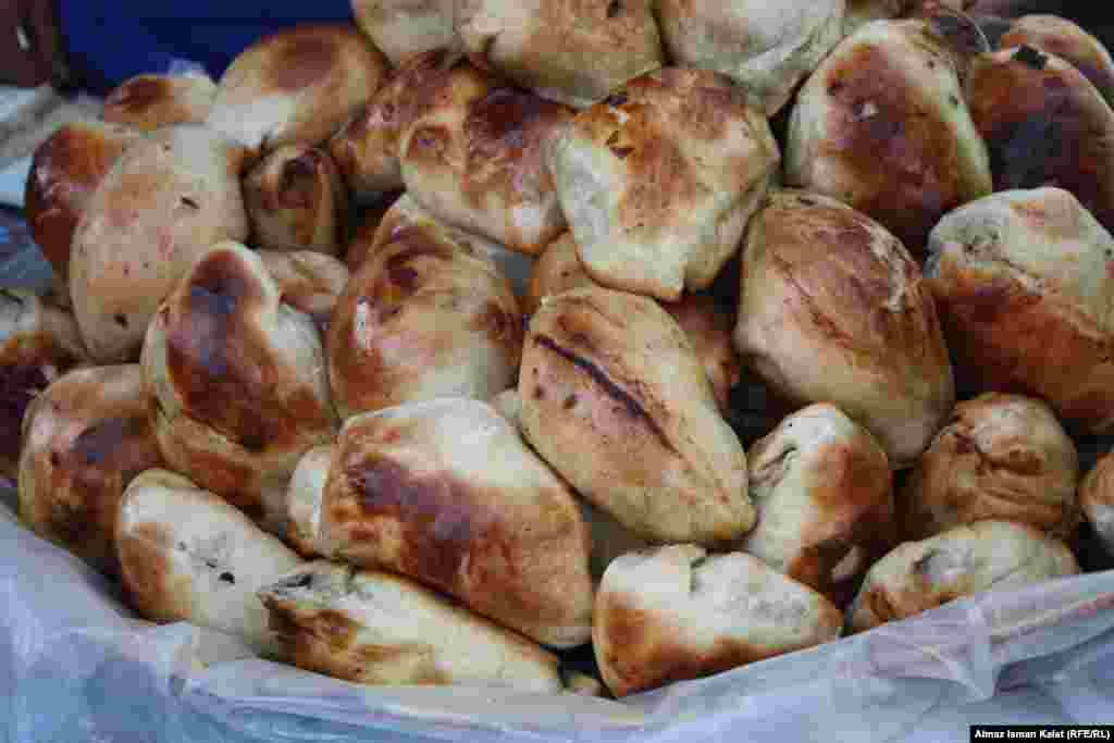 Meat-filled Kyrgyz pastries for sale in a bazaar in Osh