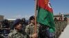 Afghan National Army soldiers stand in formation during a ceremony handing control of Bagram prison over to Afghan authorities. 