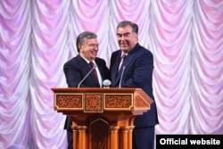 All smiles: The Tajik and Uzbek presidents, Emomali Rahmon (right) and Shavkat Mirziyoev, meet in Dushanbe on March 9.