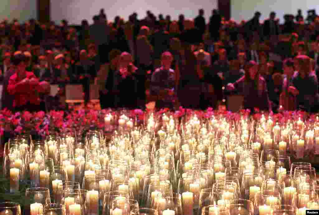 Relatives and friends of the victims of Malaysian Airlines MH17 attend a national memorial in Amsterdam. Hundreds of mourners gathered for a national commemoration ceremony nearly four months after 298 passengers, 193 of whom were Dutch, died when the airliner went down over rebel-held territory in eastern Ukraine in July. (Reuters/Jasper Juinen)