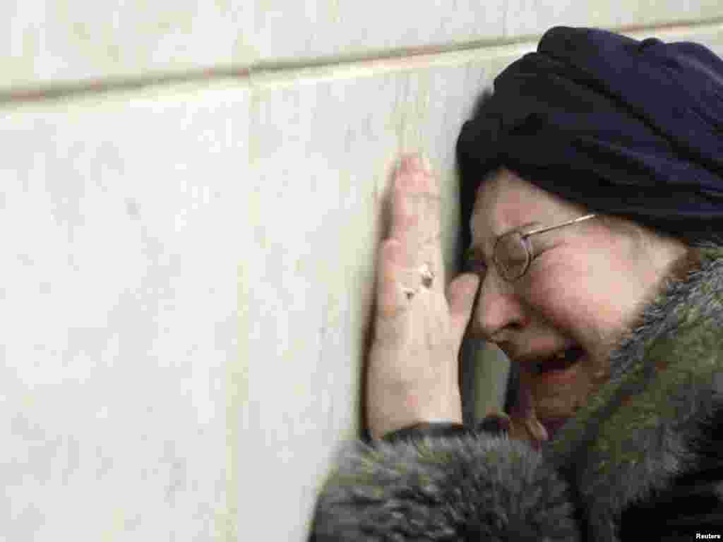 A woman cries at Lubyanka subway station in Moscow on March 30. - Moscow observed an official day of mourning on March 30 and nervous commuters returned to the subway following the twin suicide bombings on March 29. Photo by Aleksandr Natruskin for Reuters