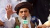 FILE: Khadim Hussain Rizvi, head of religious political Tehreek-e-Labbaik Pakistan, speaks to supporters in Lahore.