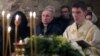 Images of Russian President Vladimir Putin (center) attending mass on Orthodox Christmas morning seemed aimed at sending a message that contrasted this placid setting with the violence and chaos at the U.S. Capitol.