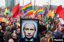 De-a lungul anilor, Putin a devenit în țările democratice un simbol al homofobiei. În imagine: un portret al președintelui rus la un gay Pride din Olanda (arhivă).