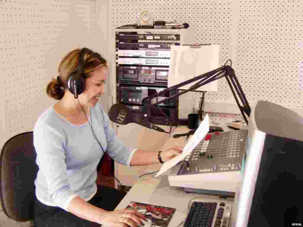 Kyrgyzstan -- female broadcaster on air at RFE/RL Kyrgyz bureau; CPP (Country Page Photo) for new website for Kyrgyz Service - Kyrgyzstan -- female broadcaster on air at RFE/RL Kyrgyz bureau; CPP (Country Page Photo) for new website for Kyrgyz Service