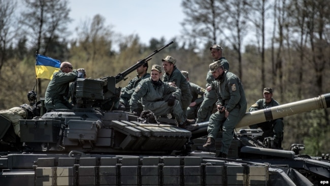 Військові України на українському танку Т-64БМ «Булат» під час міжнародних навчань «Танковий виклик сильної Європи-2017». Німеччина, 11 травня 2017 року