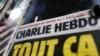 The front page of French satirical magazine Charlie Hebdo is seen at a newspapers kiosk in Paris on the opening day of the trial of the January 2015 Paris attacks against Charlie Hebdo satirical weekly