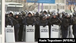 Riot police stand on duty in the western city of Aqtau, where the Kazakh authorities have maintained a heavy presence on the streets.