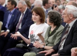 Дочь и родители Николая Луганского на церемонии вручения государственных наград в Кремле 12 июня 2019 г.