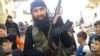 Боевик группировки ИГ, предположительно выходец из Узбекистана, на территории Сирии.