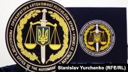 После российской оккупации Крымского полуострова обвиняемая нарушила присягу государственного служащего и пошла на сотрудничество с Россией