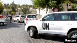 Експерти ООН на шляху до одного з місць імовірного застосування хімічної зброї поблизу Дамаска, 26 серпня 2013 року