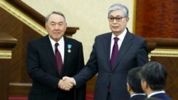 Former Kazakh President Nursultan Nazarbaev (left) and current incumbent Qasym-Zhomart Toqaev (file photo)