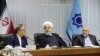 Iranian president Hassan Rouhani (C) alongside with his oil minister Bijan Zangeneh (R) and the governor of Iran's Central Bank Valiollah Seif in a meeting in the CBI headquarter in Tehran, on Sunday March 04, 2018.