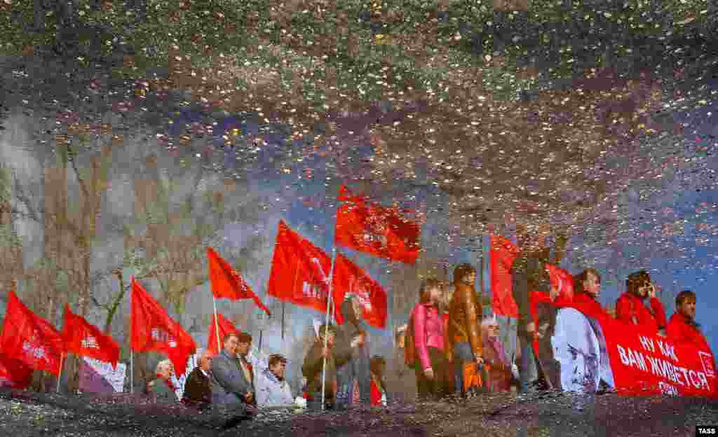 Communist Party supporters attend a May Day rally in the Ivanovo region of Russia. (ITAR-TASS/Vladimir Smirnov)