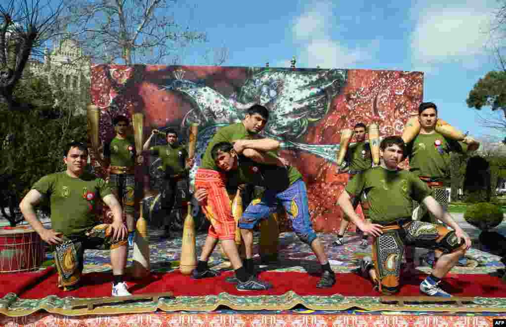 Azerbaijani enthusiasts of Varzesh-e Pahlavani, an ancient Iranian martial art, perform during celebrations of the Persian New Year, known as Noruoz, in Baku on March 19. (AFP/Tofiq Babayev)