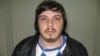 An Interpol picture of Alyaksandr Barankou, who is wanted in Belarus on bribery and fraud charges. 