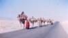 Pashtun Kuchis (nomads) on the road from Jalalabad to Kabul (Elliot and Marty Larson's photo from the 1970s).
