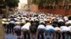 Pakistani Muslims attend the third Friday Prayer of the holy fasting month of Ramadan in Karachi on June 16. (epa/Rehan Khan)