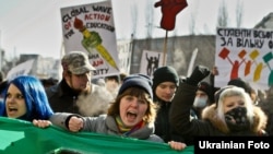 Students protest in front of parliament in Kyiv.