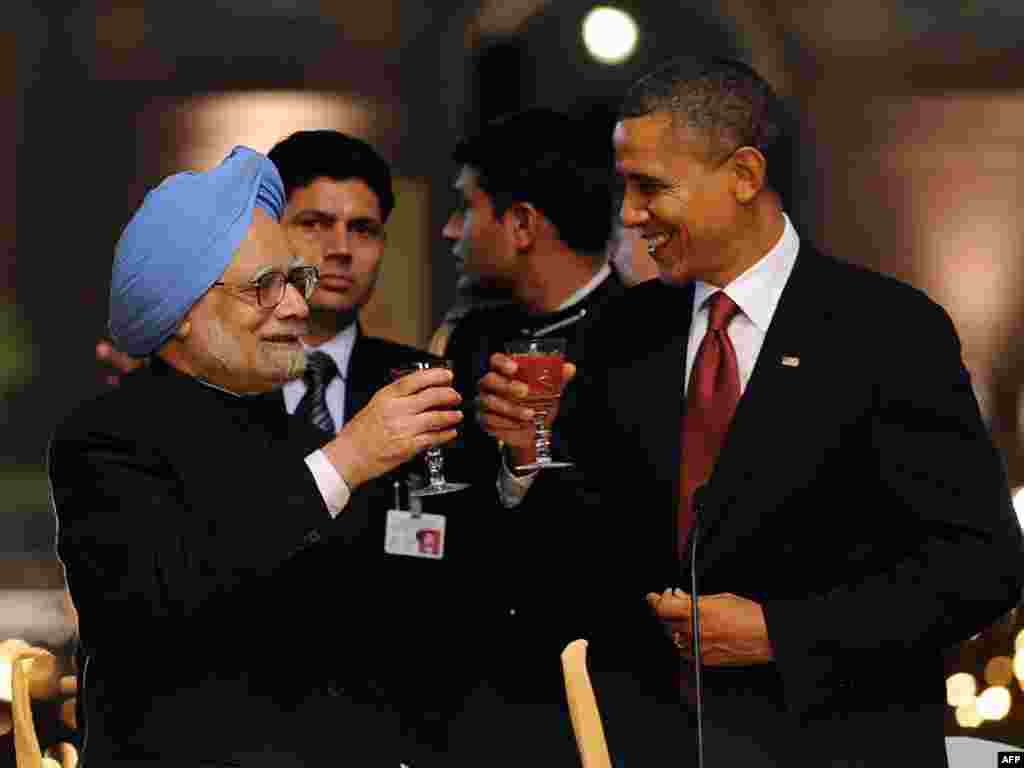  باراک اوباما، رییس جمهوری آمریکا (راست) مانموهان سینگ، نخست وزیر هند - هند