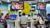 China -- Foreign journalists surf the Internet at the main press center on the Olympic Green in Beijing, 30Jul2008