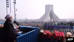 Iranian President Hassan Rohani delivers a speech during a ceremony on the anniversary of the Islamic Revolution in Tehran on February 10.