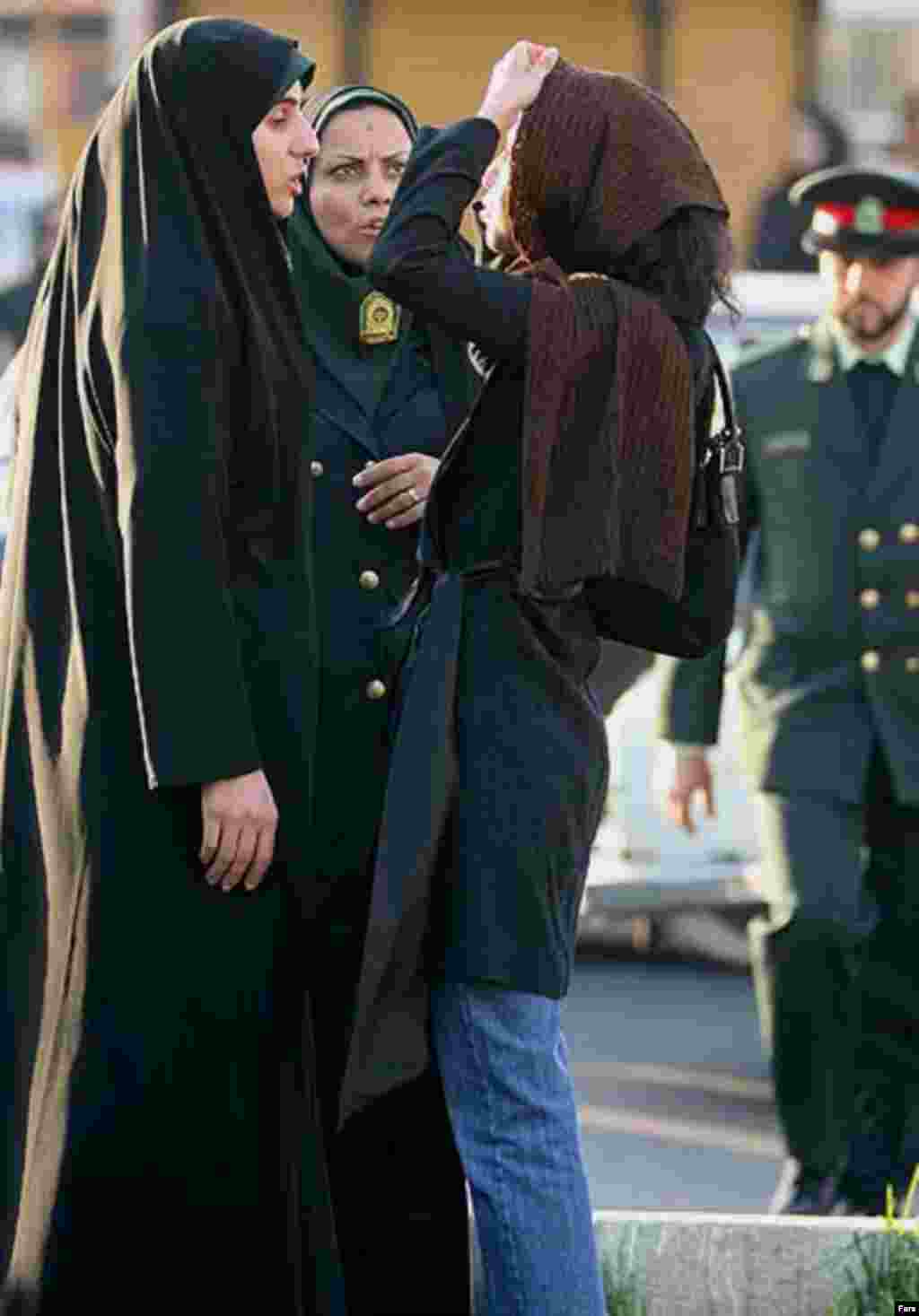 Police and Basij activists check women for proper dress in Tehran on April 22 (Fars) - Iranian Culture Minister Hussein Saffar-Herandi told the media on April 24 not to undermine the police's public-decency drive with undue criticism. And he threatened them with a firm response if they disseminate what he termed "divisive" criticism.