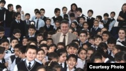 Azeri writer Elchin Huseynbeyli with children