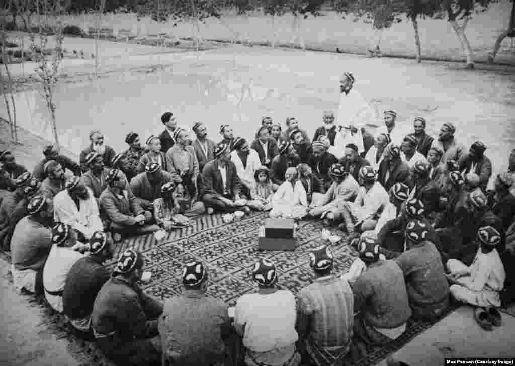 A meeting of Uzbek men photographed by Max Penson in the early 20th century. In a 2018 interview with RFE/RL, Penson's grandson Maxime reflected on what it must have been like for his grandfather to arrive in Central Asia more than a century ago. “Different smells, different colors, different people. Everything is different,” he said.