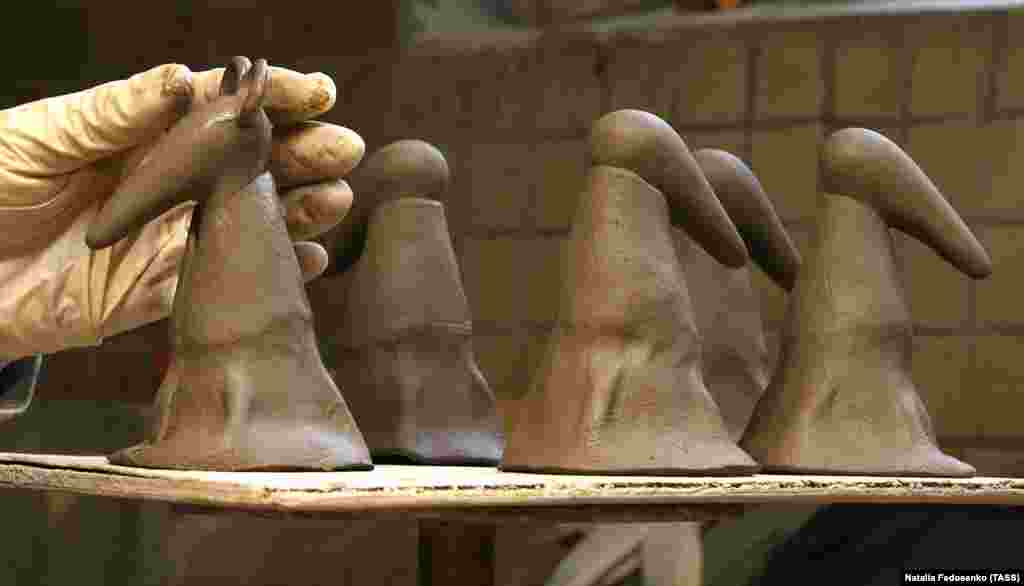 Long-nosed rodents taking shape under a potter&rsquo;s fingers.