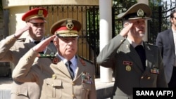 SYRIA -- Iranian Defense Minister Amir Hatami (right) meets with his Syrian counterpart Abdullah Ayoub in the capital Damascus, August 26, 2018