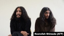 FILE: Alleged militants of the Islamic state (IS) Sediqullah (L) and Sajjad are pictured after they surrendered to the Afghan National Directorate of Security (NDS) in September.