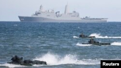 More than 5,000 air, sea and ground troops take part in a multinational NATO maritime exercise in the Baltic Sea to demonstrate the resolve of allied and partner forces to defend the Baltic region near Ustka, Poland, in June 2015.