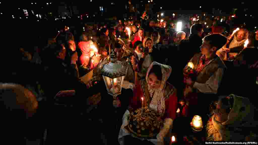 After believers&#39; candles are lit, they recite a prayer, followed by a midnight procession around the cathedral.&nbsp;