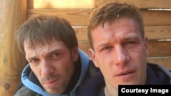 Radio Liberty correspondents Andrei Kostyanov (right) and Sergei Khazov-Cassia (file photo)