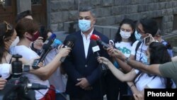 Armenia -- Former National Security Service Director Artur Vanetsian speaks to journalists outside the NSS headquarters in Yerevan, July 31, 2020.