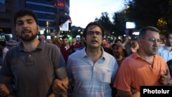 Armenia -- Davit Sanasarian (L) and other opposition activists lead a demonstration in support of gunmen that seized a police station in Yerevan, July 29, 2016.